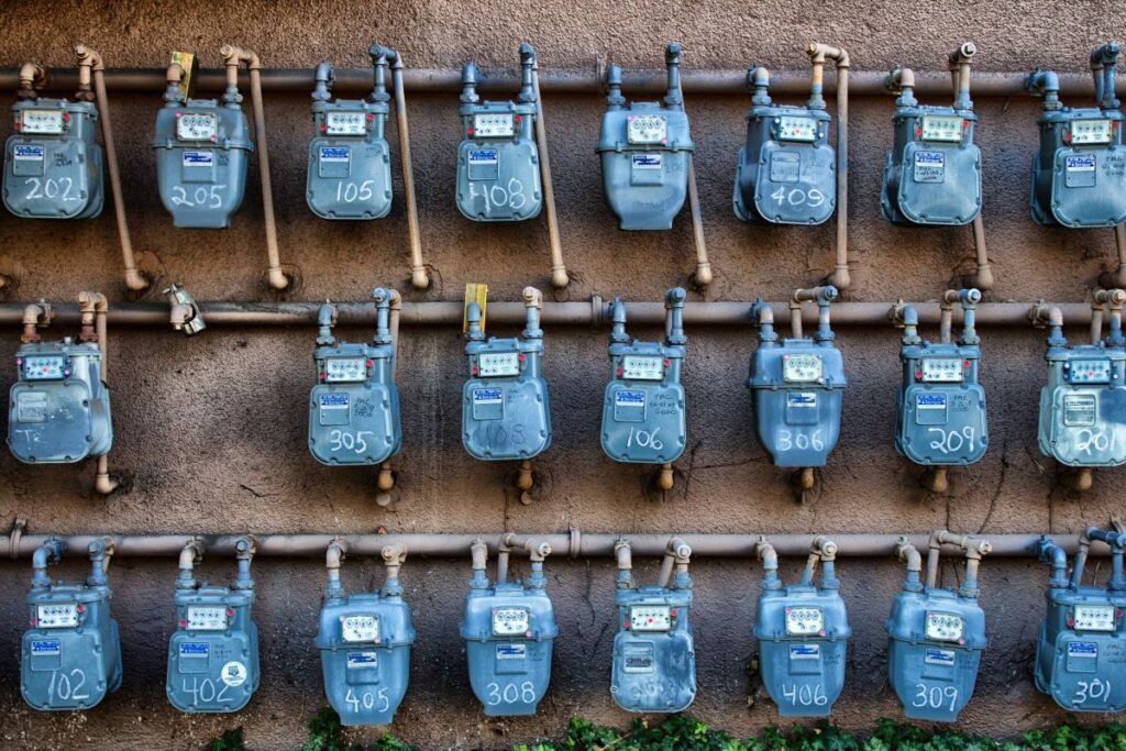 Meters in a row mounted to a wall used for MOP contracts