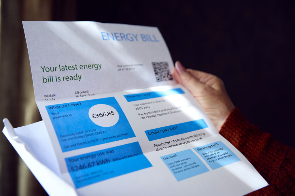 someone holding an energy bill