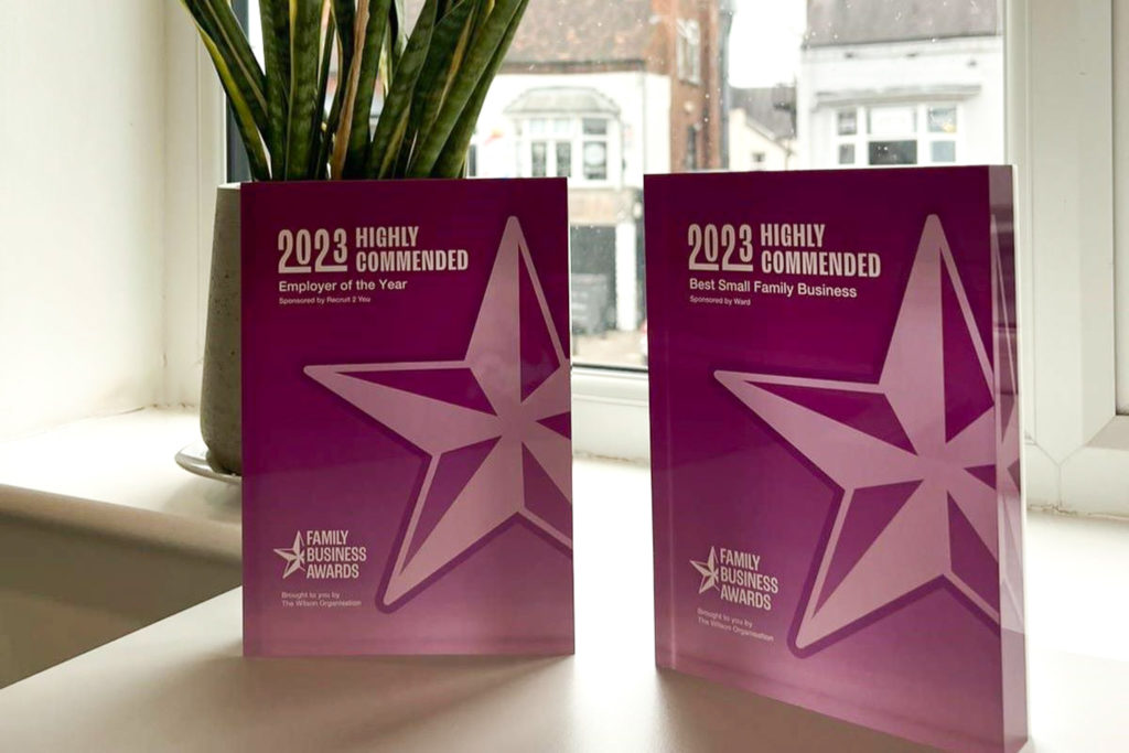 Two of Flame UK's awards plaques from the Midlands Family Business Awards